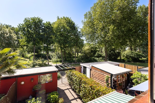 Foto - Te koop: Goed onderhouden tussenwoning in rustige woonwijk!
